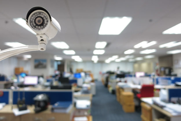 CCTV Camera security operating in office building.